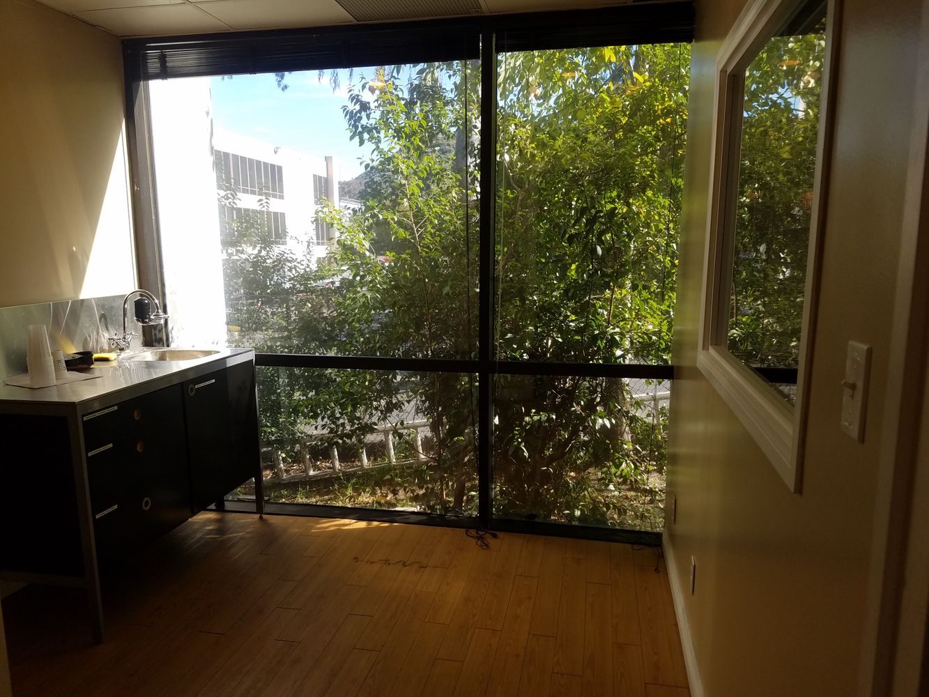 Ground floor office with beautiful tile entry and reception. Several uses.